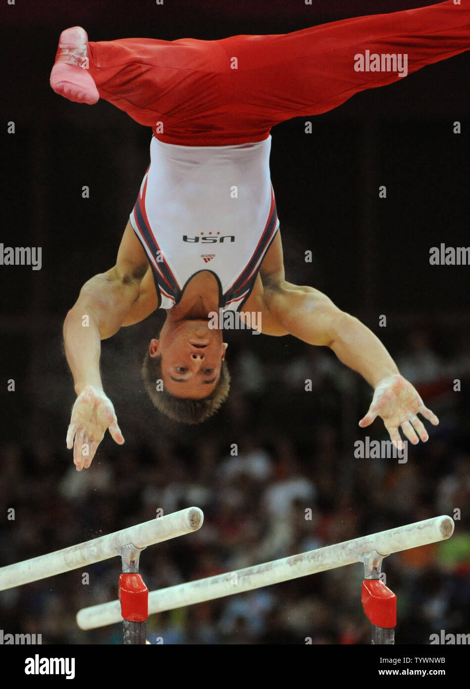 USA's Samuel Mikulak flips in his routine on the Parallel Bars at the