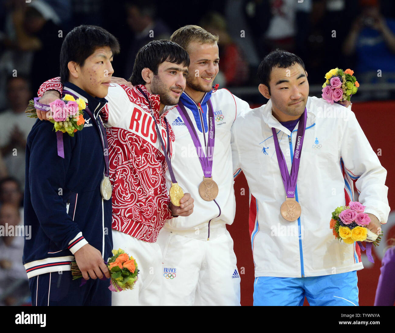 Men's Judo 73kg medal winners at the London 2012 Summer Olympics on July 30, 2012 in London. From left to right: Riki Nakaya of Japan, Silver Medal; Mansur Isaev of Russia, Gold Medal; Ugo LeGrand of France, Bronze Medal; and Nyam-Ochir Sainjargal of Mongolia, Bronze Medal.  UPI/Ron Sachs Stock Photo