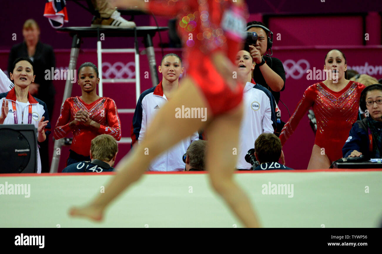 The United States Gymnastics Team Watch Teammate Alexandra Raisman On Her Floor Exercise Routine To Win The Gold Medal For The Usa Team At The Women S Gymnastics Team Event At The North The United States Gymnastics Team Watch Teammate Alexandra Raisman On Her Floor Exercise Routine To Win The Gold Medal For The Usa Team At The Women S Gymnastics Team Event At The North