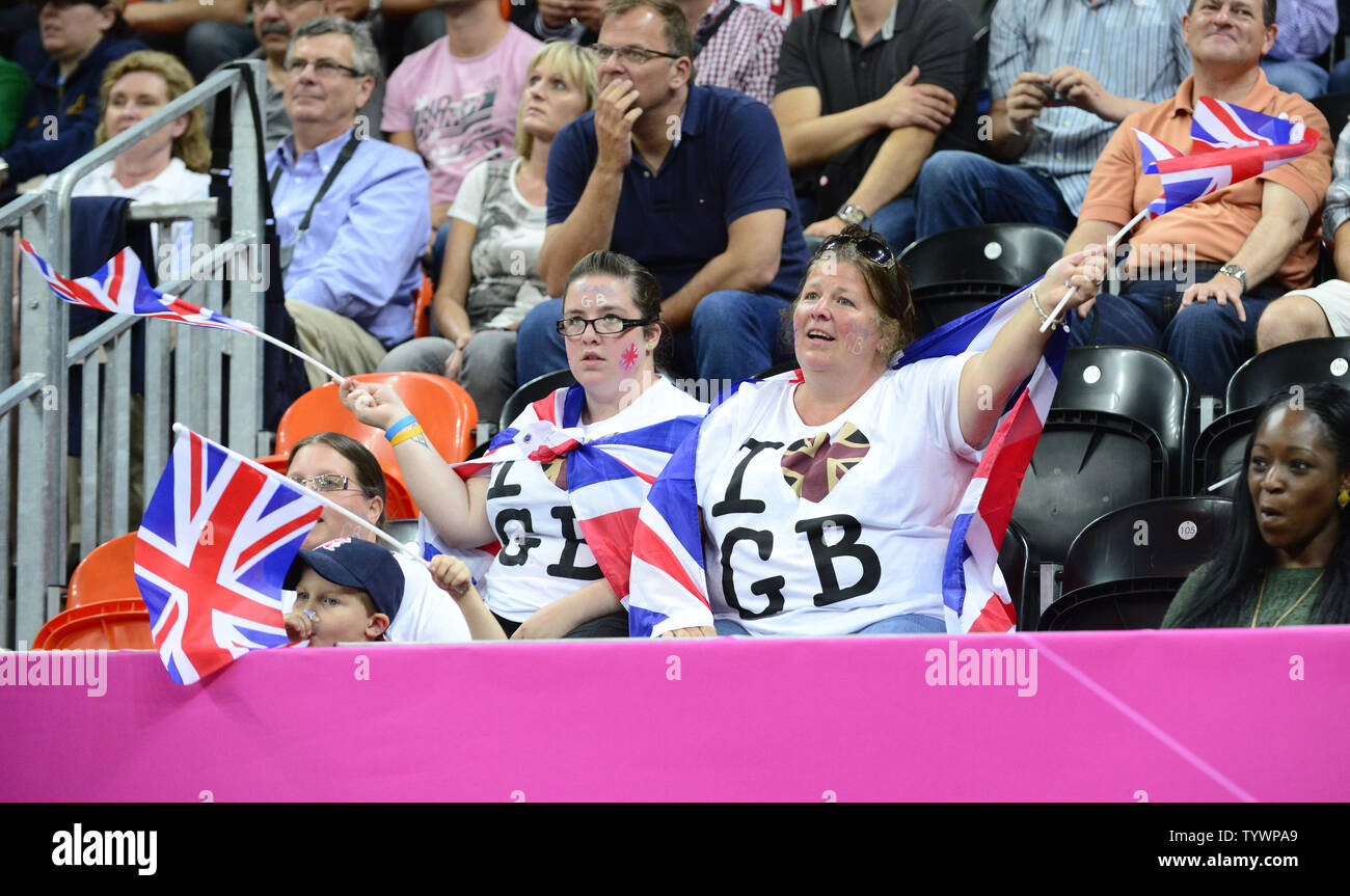 Spectators cheer for their team in the first half of the Great Britain v. Brazil preliminary round - group B basketball game at the London 2012 Summer Olympics on July 31, 2012 in London.   UPI/Ron Sachs Stock Photo