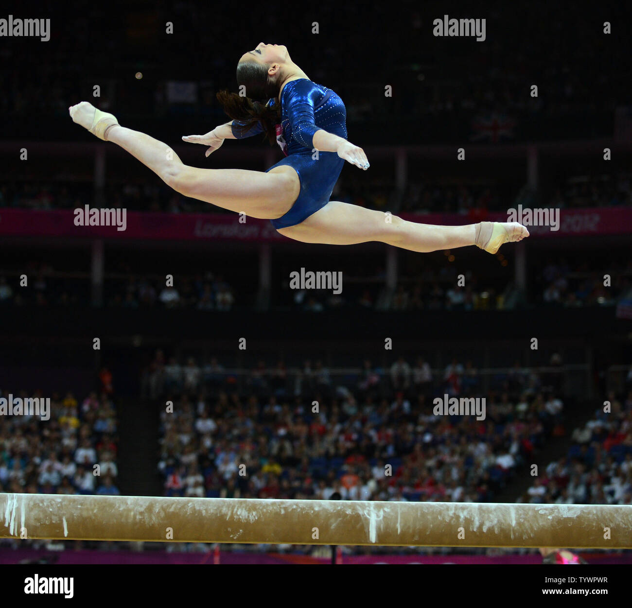 Russia S Aliya Mustafina Flies In The Air In Her Routine On The