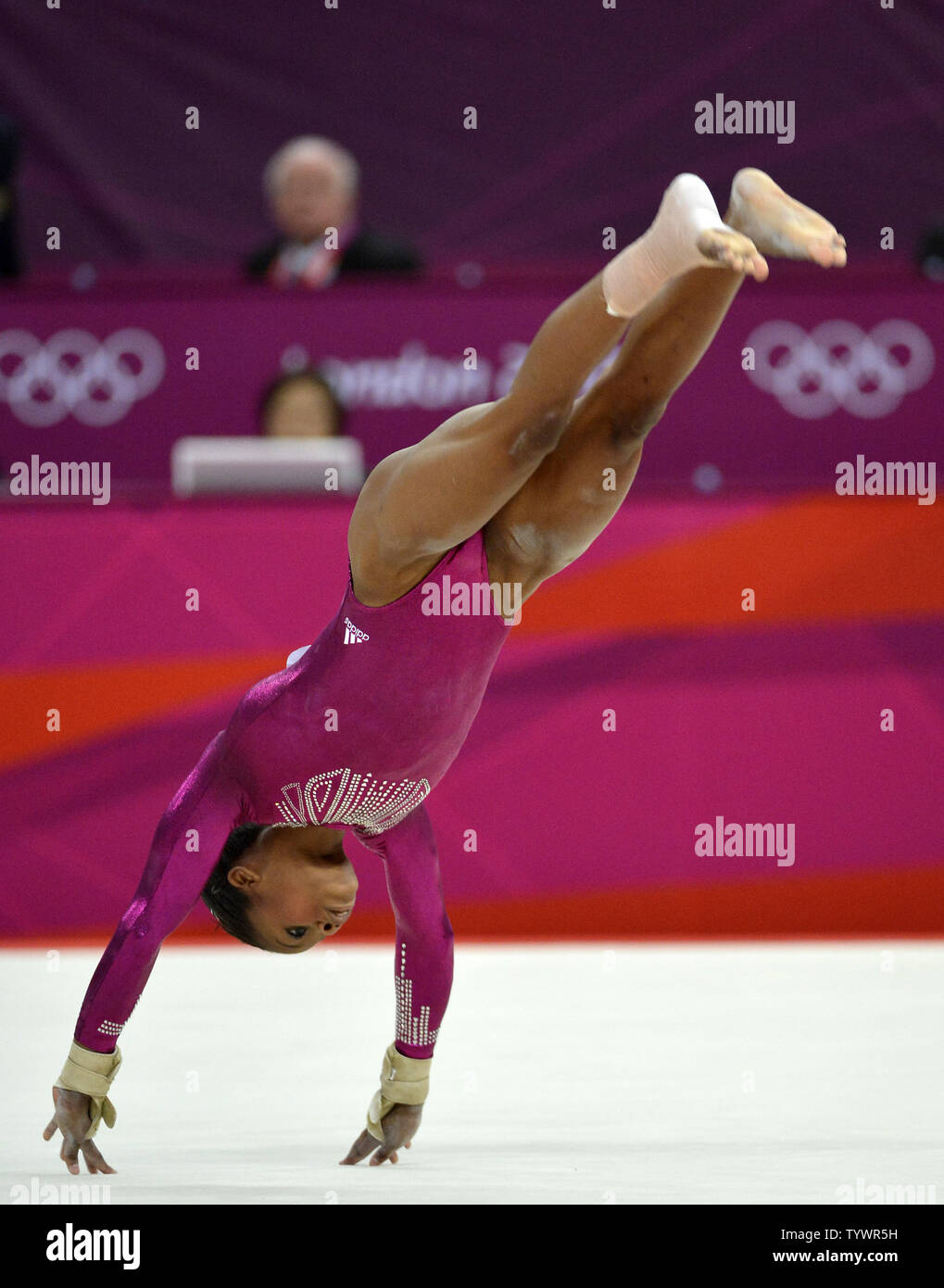 American Gymnast Gabrielle Douglas Goes Through Her Routine On The