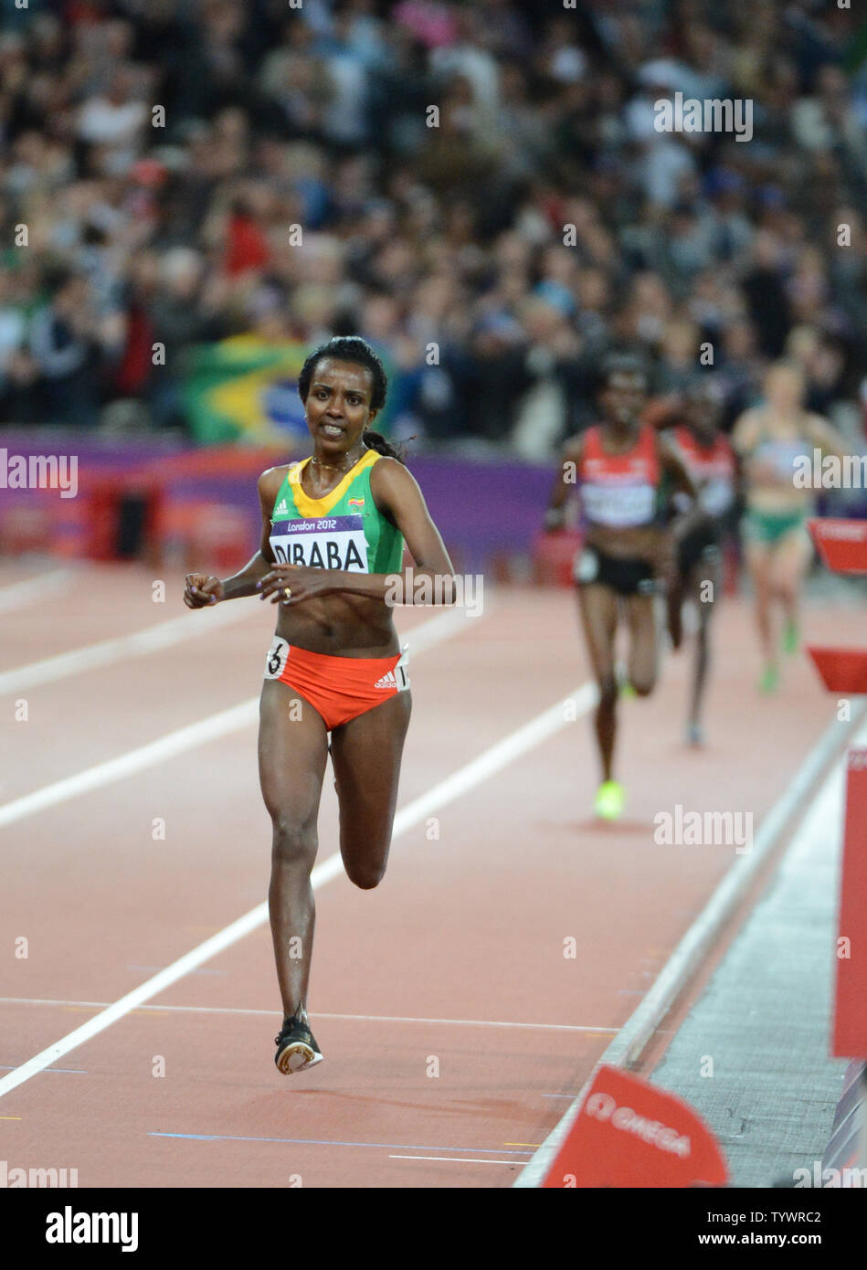 Tirunesh Dibaba of Ethiopia is all alone winning the Women's 10,000M in ...