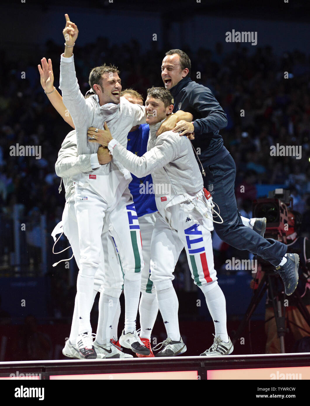 The Italian Men's Sabre Team celebrates its 45 - 40 victory over Russia in the Bronze Medal match at the London 2012 Summer Olympics on August 3, 2012 in London.   UPI/Ron Sachs Stock Photo
