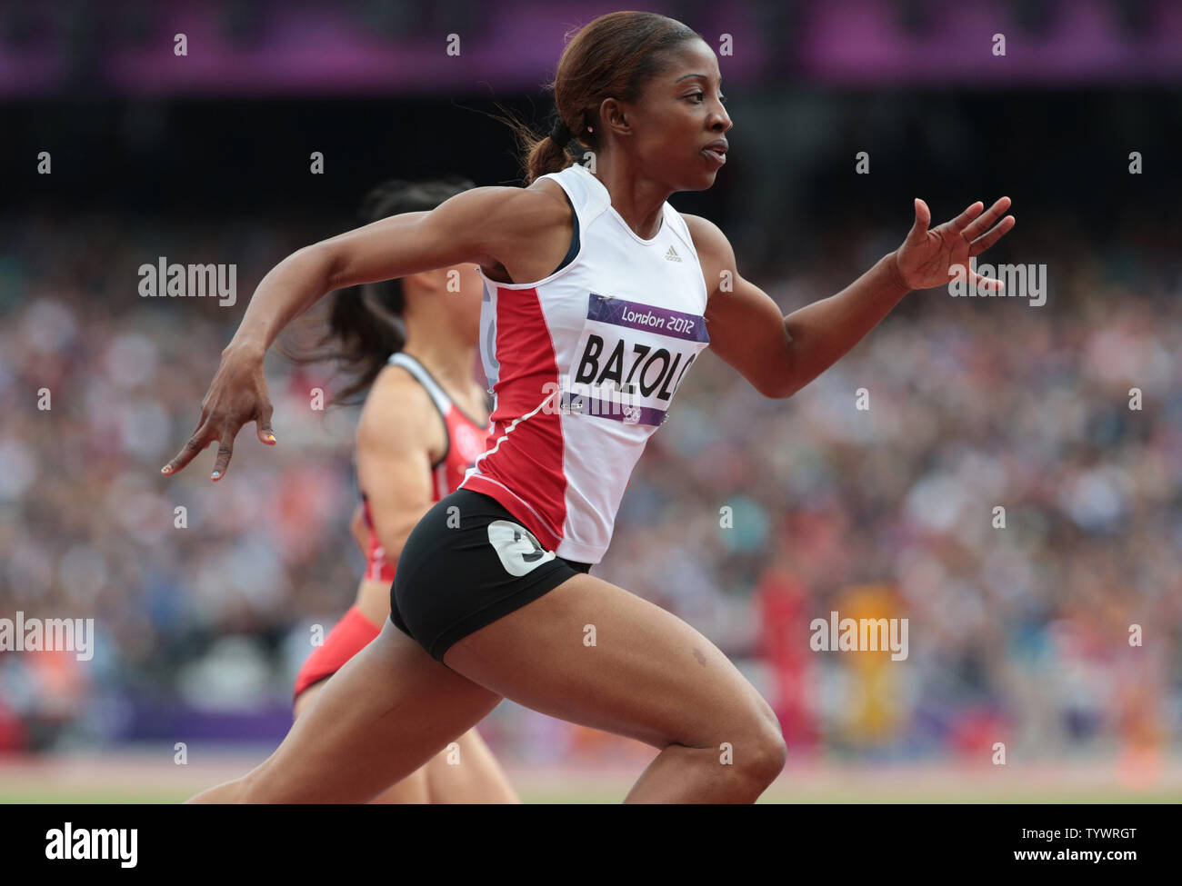 Congo S Lorene Bazolo Takes Part In The Women S 100 Metres Preliminary Heat On The First Day Of The Athletics In The Olympics Stadium At The London 2012 Summer Olympics On August 3