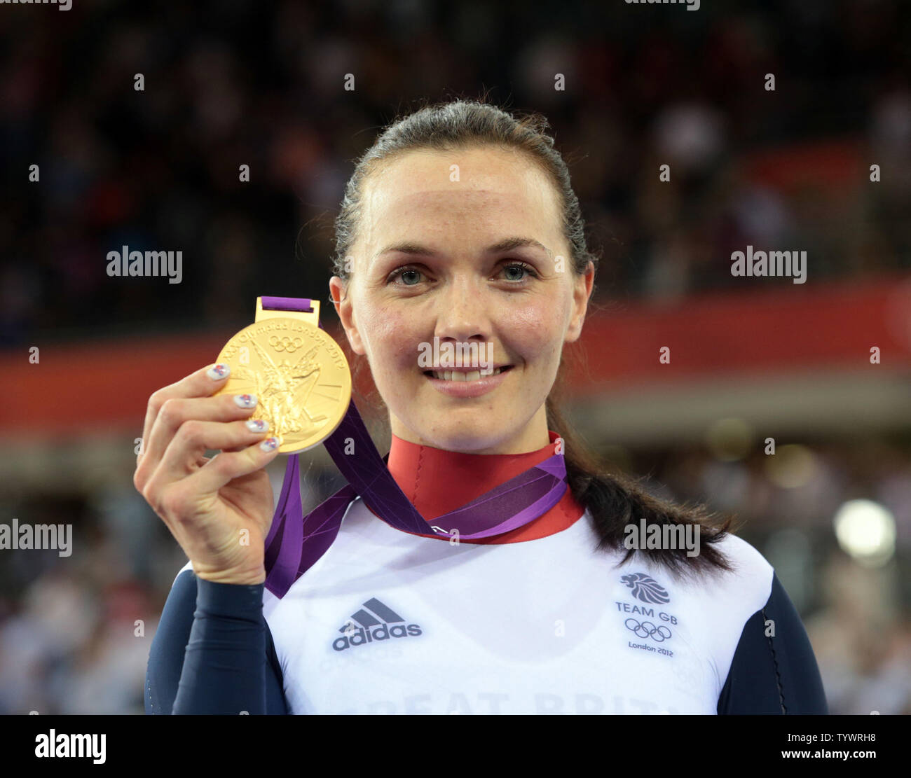 Great Britain's Victoria Pendleton holds her gold medal after winning the Women's Kerin cycling event at the Velodrome at the London 2012 Summer Olympics on August 03, 2012 in  London.     UPI/Hugo Philpott Stock Photo