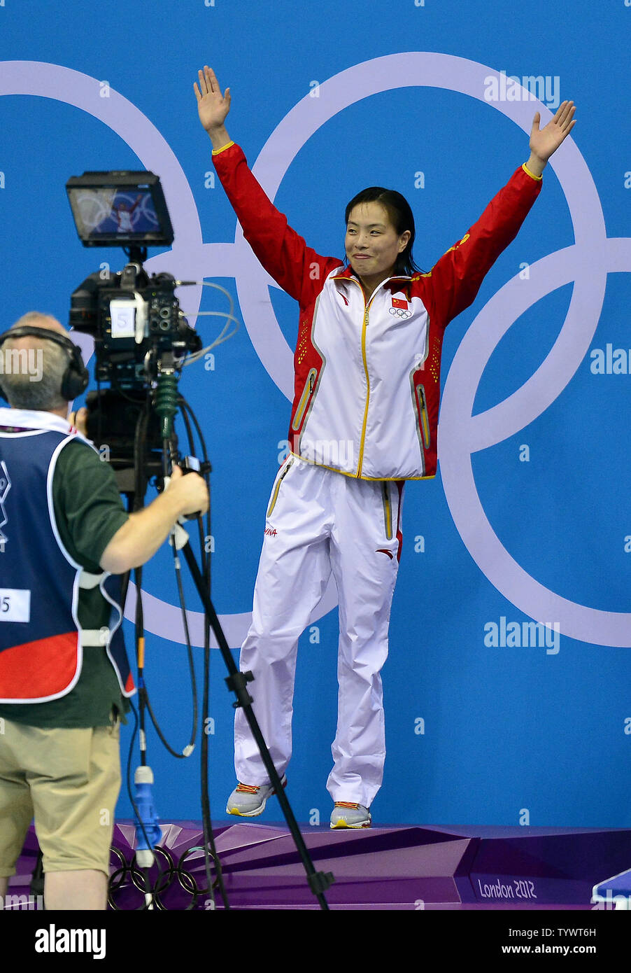 Wu Minxia Of China Acknowledges The Cheers Of The Crowd As She Accepts