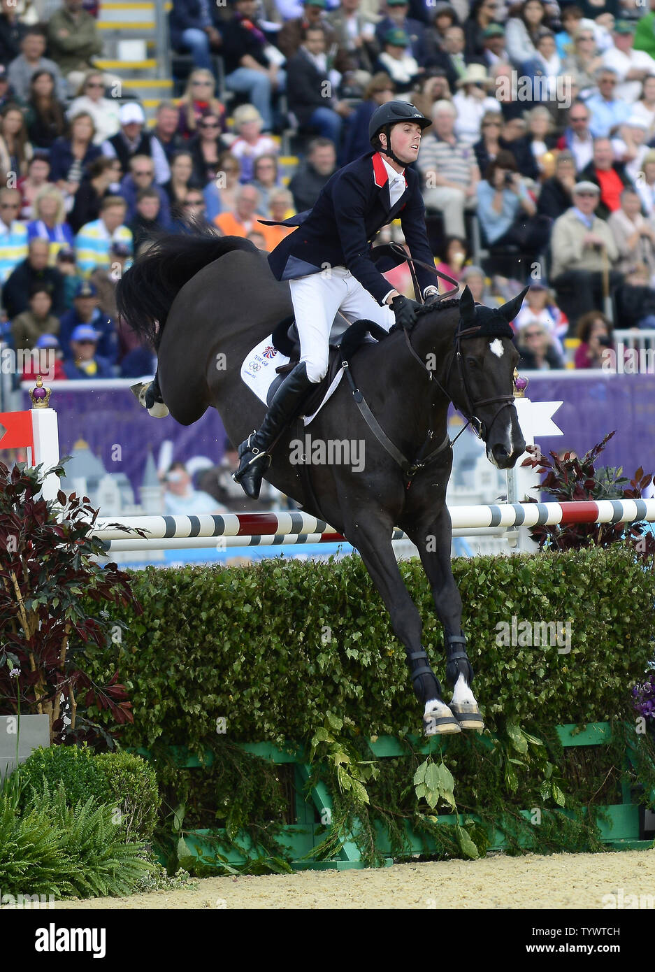 Ben Maher of the United Kingdom, riding Tripple X, competes in the 'Jump Off' for the Gold Medal against the Netherlands in the Equestrian Individual Jumping competition at the London 2012 Summer Olympics on August 5, 2012 in London.   UPI/Ron Sachs Stock Photo