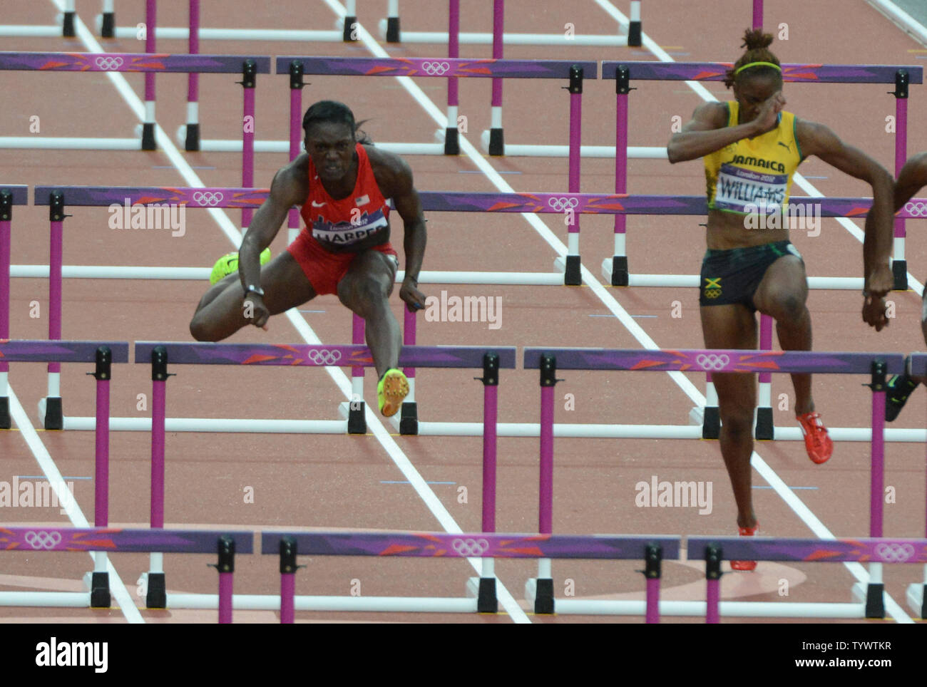 Dawn Harper of the USA clears a hurdle in the semifinals of Women's
