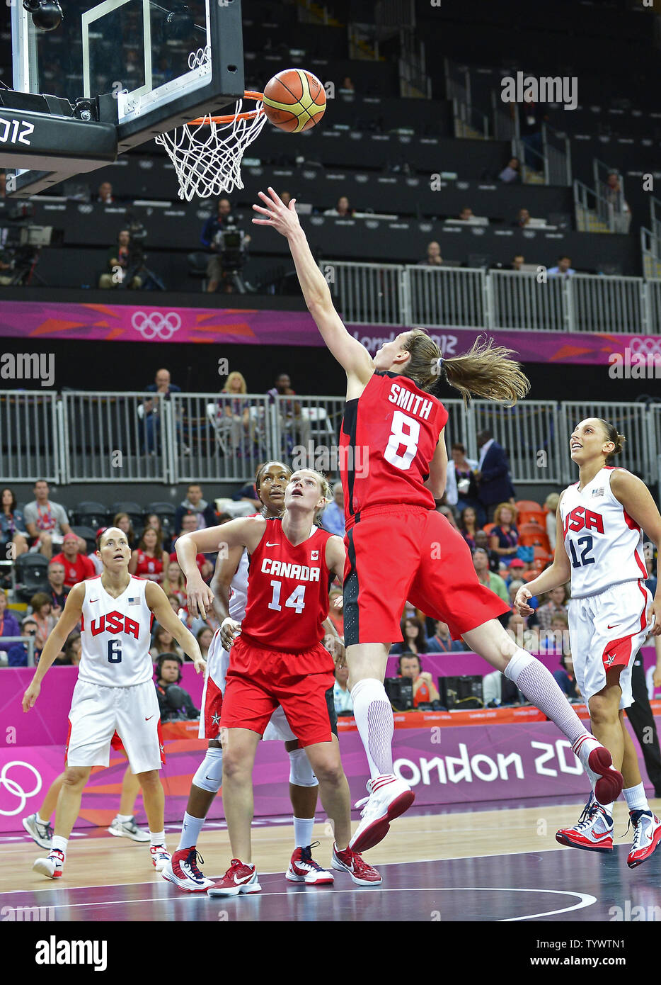 Guard Kim Smith (8) of Canada tries to score in first quarter action against the United States of America in the Women's Basketball quarterfinal at the London 2012 Summer Olympics on August 7, 2012 in London.   UPI/Ron Sachs Stock Photo