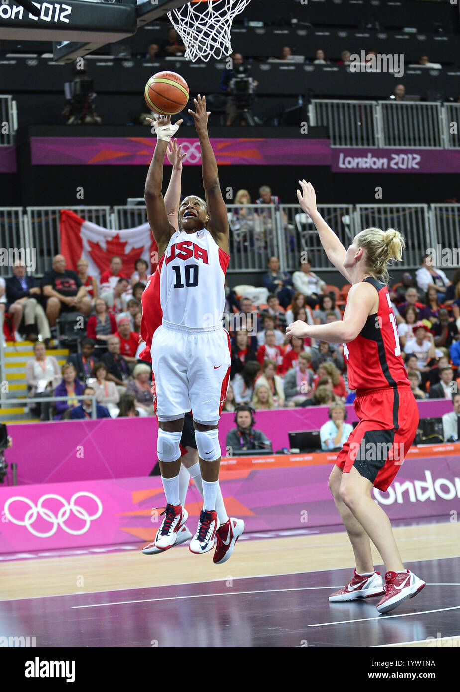 https://c8.alamy.com/comp/TYWTNA/guard-tamika-catchings-10-of-the-united-states-of-america-shoots-in-second-half-action-against-canada-in-the-womens-basketball-quarterfinal-at-the-london-2012-summer-olympics-on-august-7-2012-in-london-the-usa-won-the-game-91-48-upiron-sachs-TYWTNA.jpg