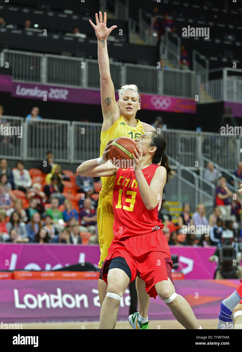 Forward Xiaoli Chen (13) of China looks to shoot over forward/center Lauren Jackson (15) of Australia in the Women's Basketball quarterfinal at the London 2012 Summer Olympics on August 7, 2012 in London.   UPI/Ron Sachs Stock Photo