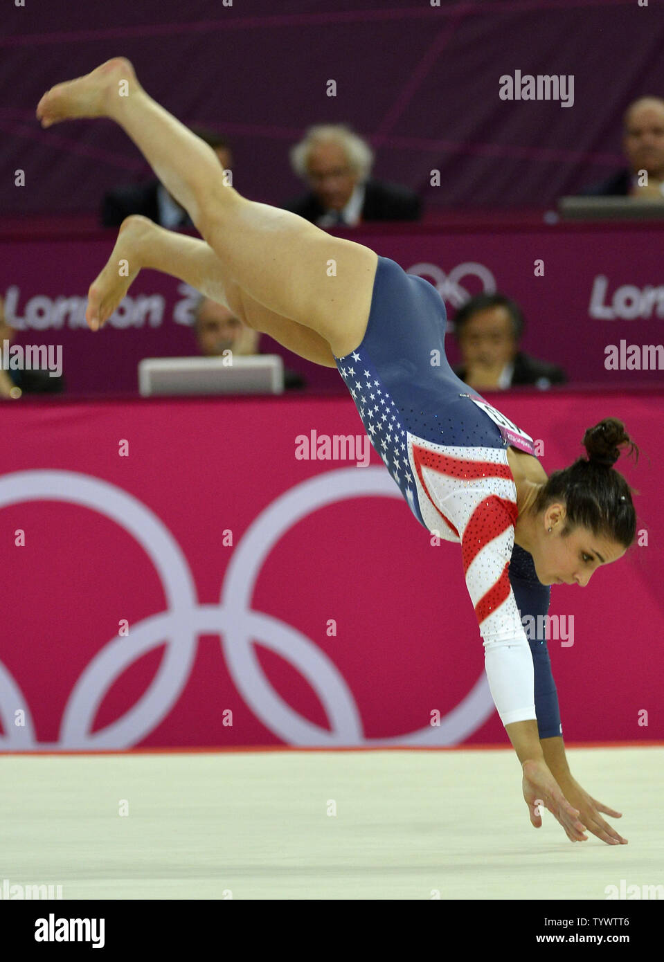 American gymnast Alexandra Raisman is airborne as she goes through her ...