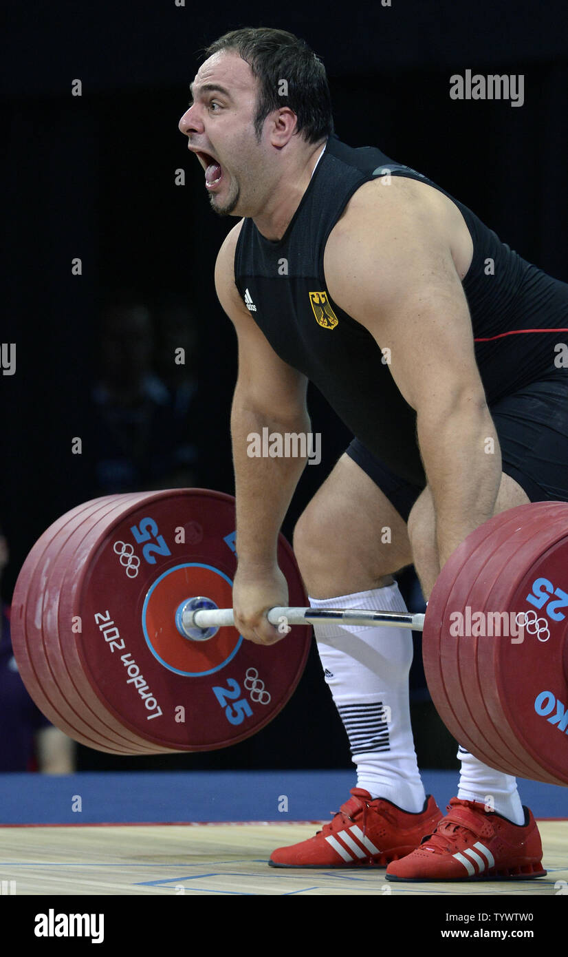 German weightlifter Almir Velagic lets out a yell as he makes a successful lift lifts during the Men's 105kg+ Group A class, at the Excel Arena at the 2012 Summer Olympics, August 7, 2012, in London, England.              UPI/Mike Theiler Stock Photo
