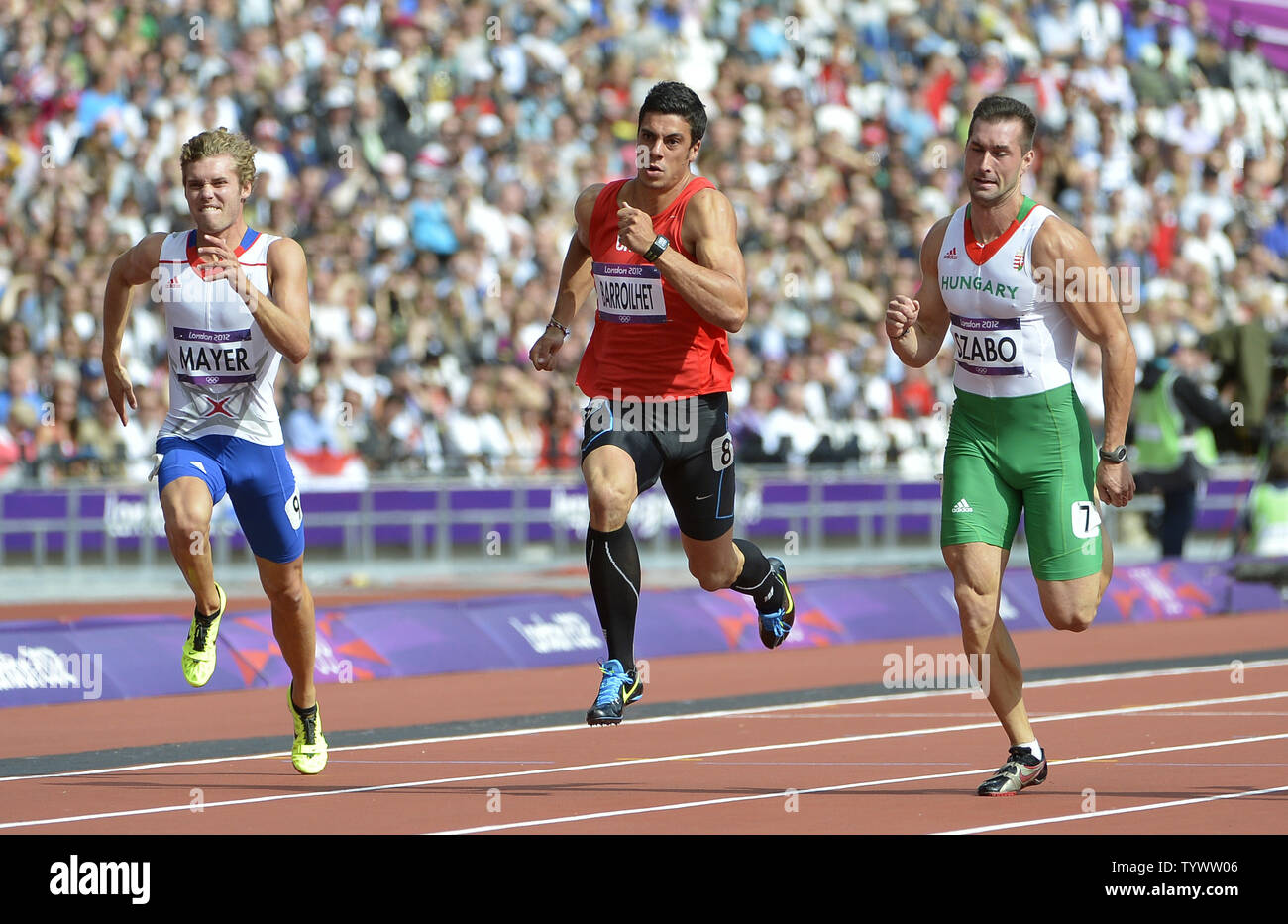 Kevin Mayer of France, Gonzalo Barroilhet of Chile and Attila Szabo of Hungary compete in the 100M of the Men's Decathlon at the London 2012 Summer Olympics on August 8, 2012 in Stratford, London. Mayer finished in 111.32 seconds, Barroilhet in 11.18 seconds and Szabo in 11.15 seconds.     UPI/Brian Kersey Stock Photo