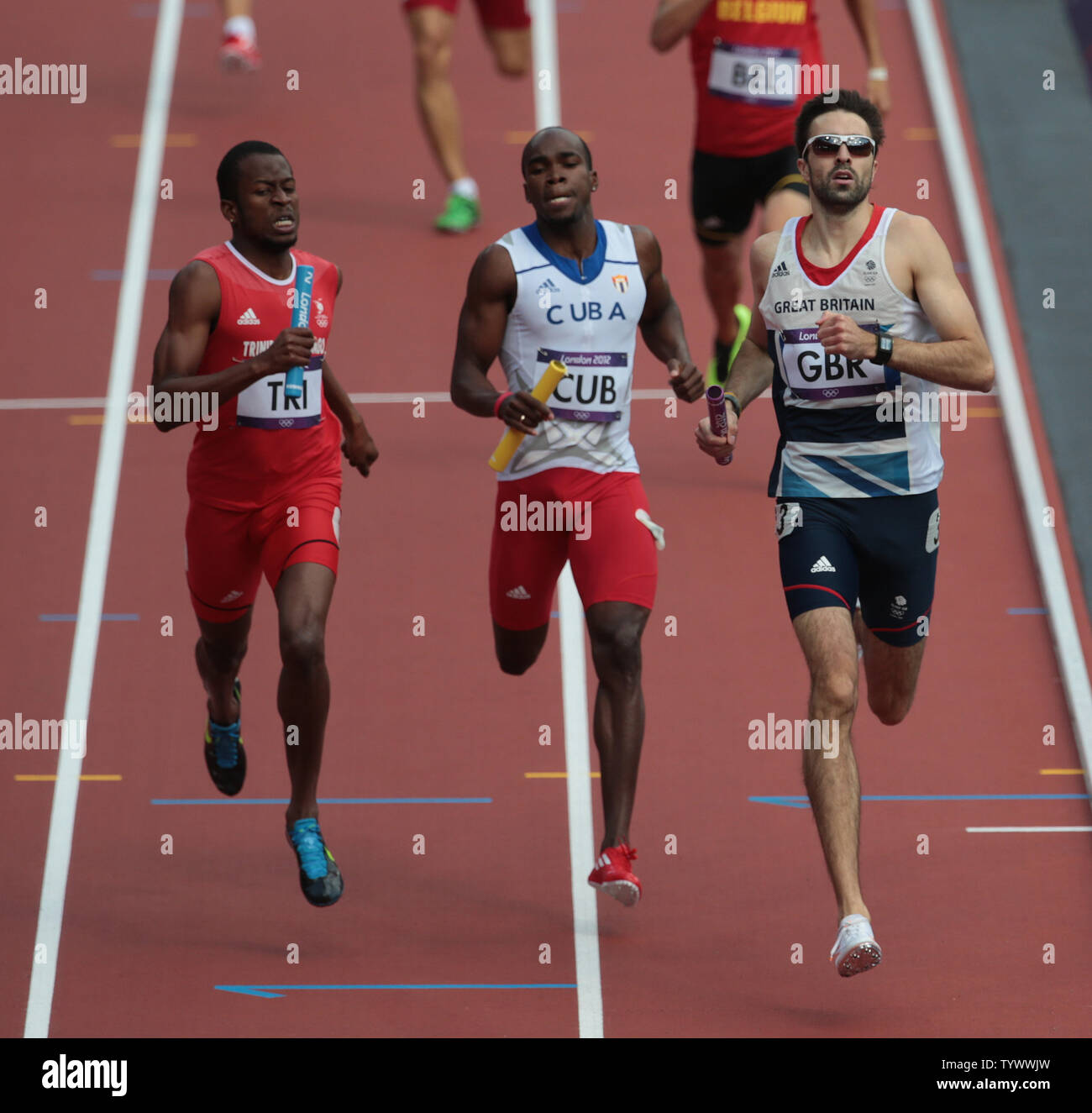 L R Trinidad S Deon Lendore Cuba S Omar Cisneros And Great Britain S Martyn Rooney Run The Fourth Leg Of The Men S 4x400 Metres Relay Heats On The Seventh Day Of The Athletics In The
