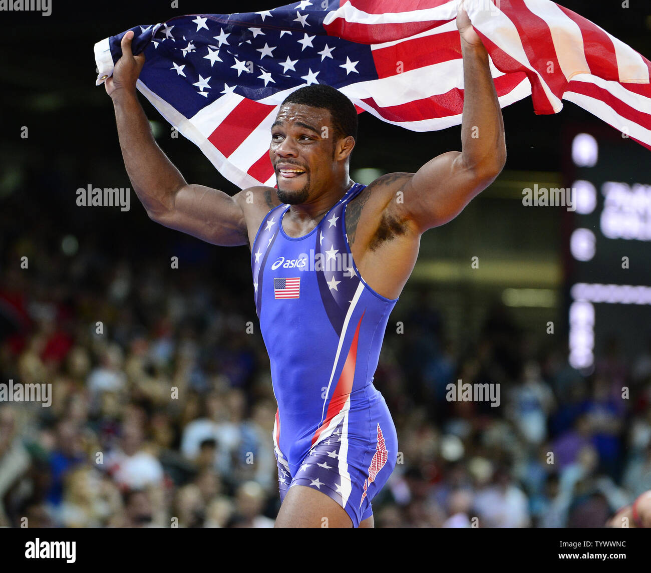 Jordan Ernest Burroughs of the United States of America celebrates after winning the Gold Medal in the Men's 74kg Freestyle Wrestling against Sadegh Saeed Goudarzi of Iran at the London 2012 Summer Olympics on August 10, 2012 in London. UPI/Ron Sachs Stock Photo