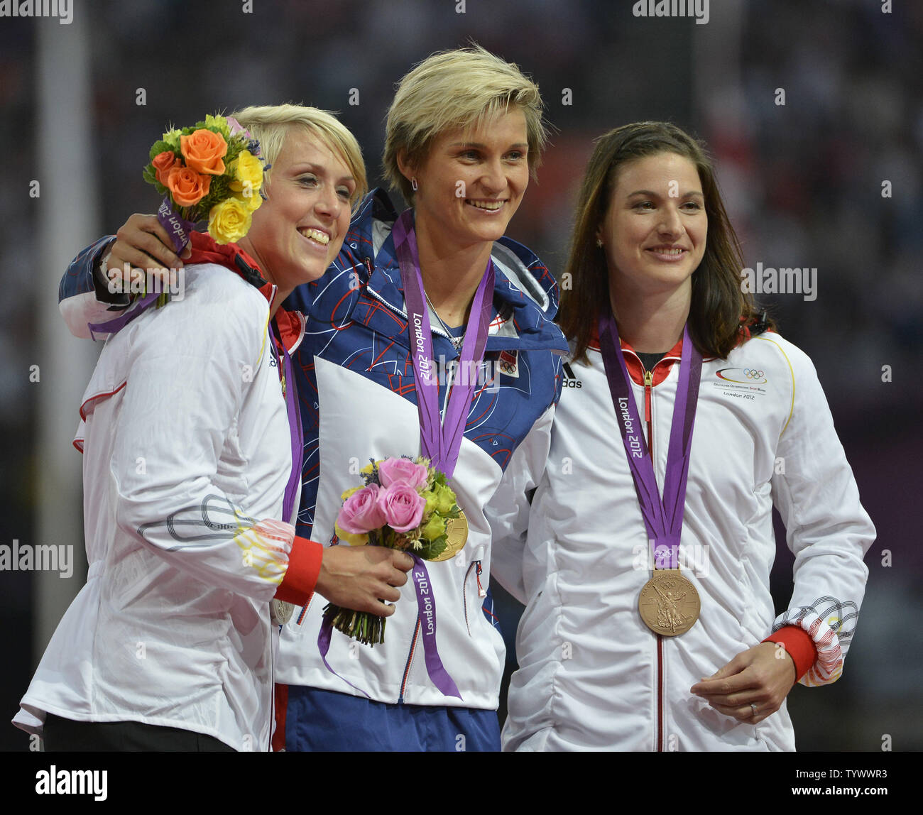 Silver Medalist Christina Obergfoll of Germany, (L-R) Gold Medalist Barbora Spotakova of the Czech Republic and Linda Stahl of Germany laugh during the Victory Ceremony for the Women's Javelin Throw at the London 2012 Summer Olympics on August 10, 2012 in Stratford, London. Spotakova won Gold with a throw of 69.55M while Obergfoll hit a mark of 65.16 and Stahl threw a season-best 64.91 in the final.      UPI/Brian Kersey Stock Photo