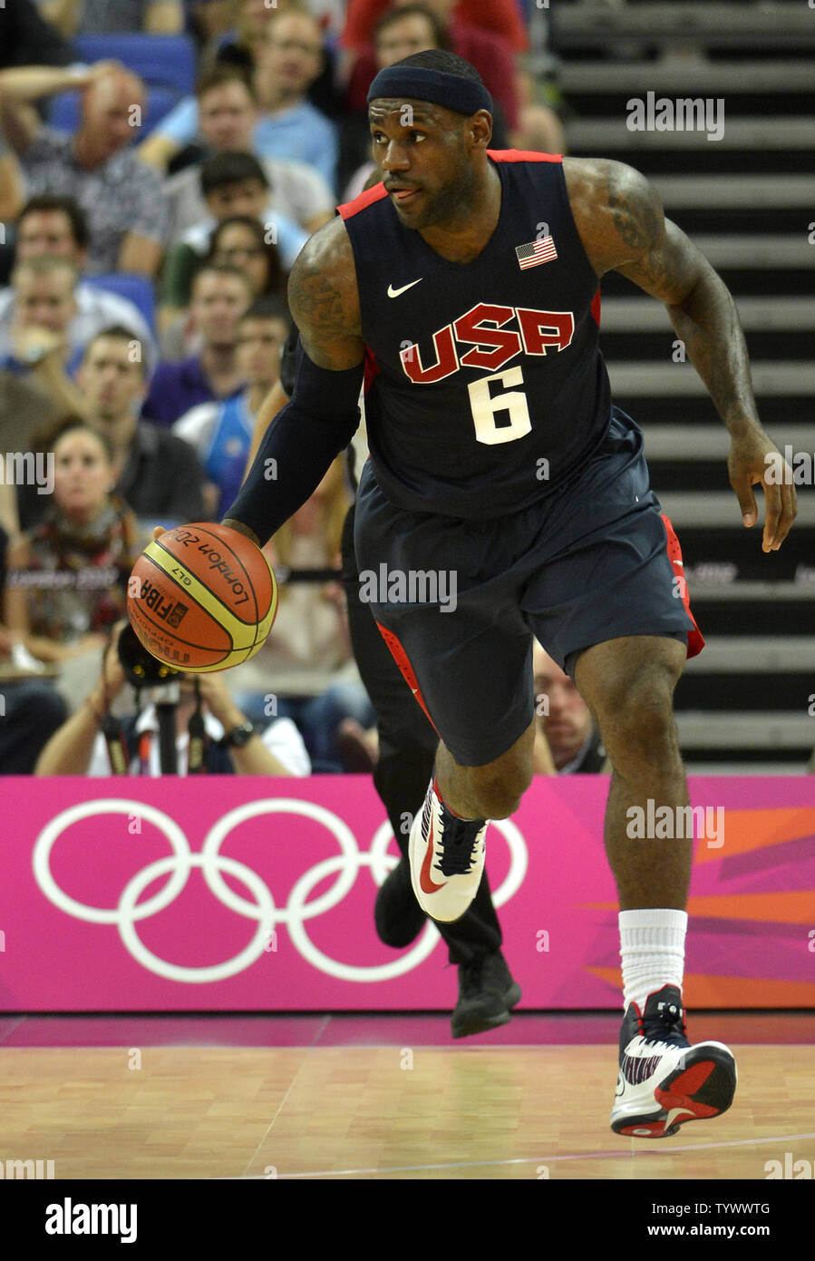 United States' Lebron James dribbles up the court as the US defeated ...