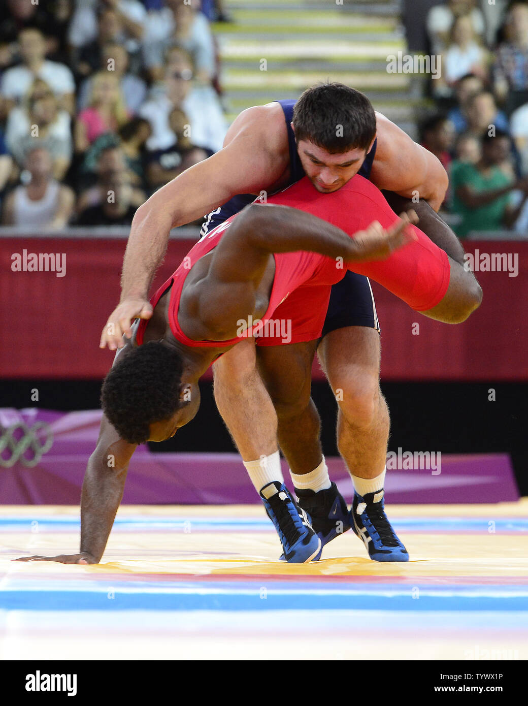 Jaime Yusept Espinal of Puerto Rico, bottom, and Sharif Sharifov of