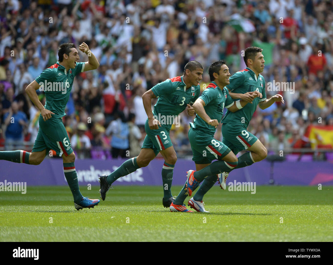 Hector Herrera, Carlos Salcido, Marco Fabian and Oribe Peralta of Mexico celebrate Peralta's goal during the first half of the Gold Medal Football Match against Brazil at the London 2012 Summer Olympics on August 11, 2012 at Wembley Stadium, London.      UPI/Brian Kersey Stock Photo