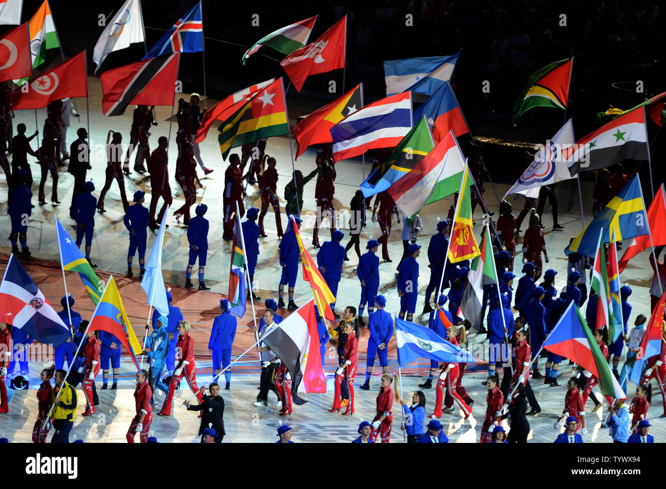Flags of the Olympic nations parade at the closing ceremony of the