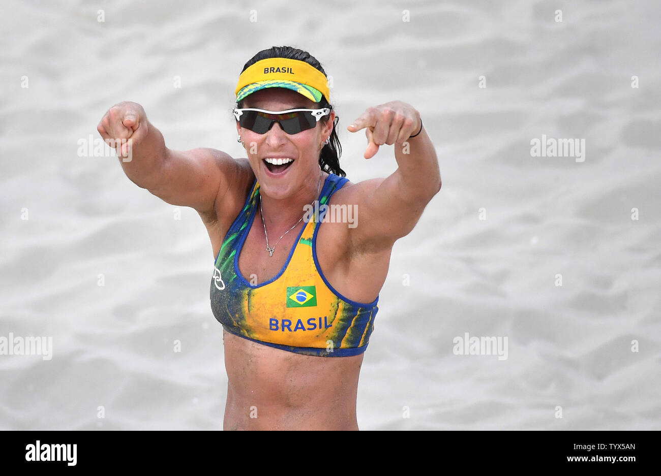 Brazil's Agatha Rippel celebrates after scoring on the Czech Republic during their preliminary beach volleyball game in the 2016 Rio Summer Olympics in Rio de Janeiro, Brazil, August 6, 2016. Photo by Kevin Dietsch/UPI Stock Photo
