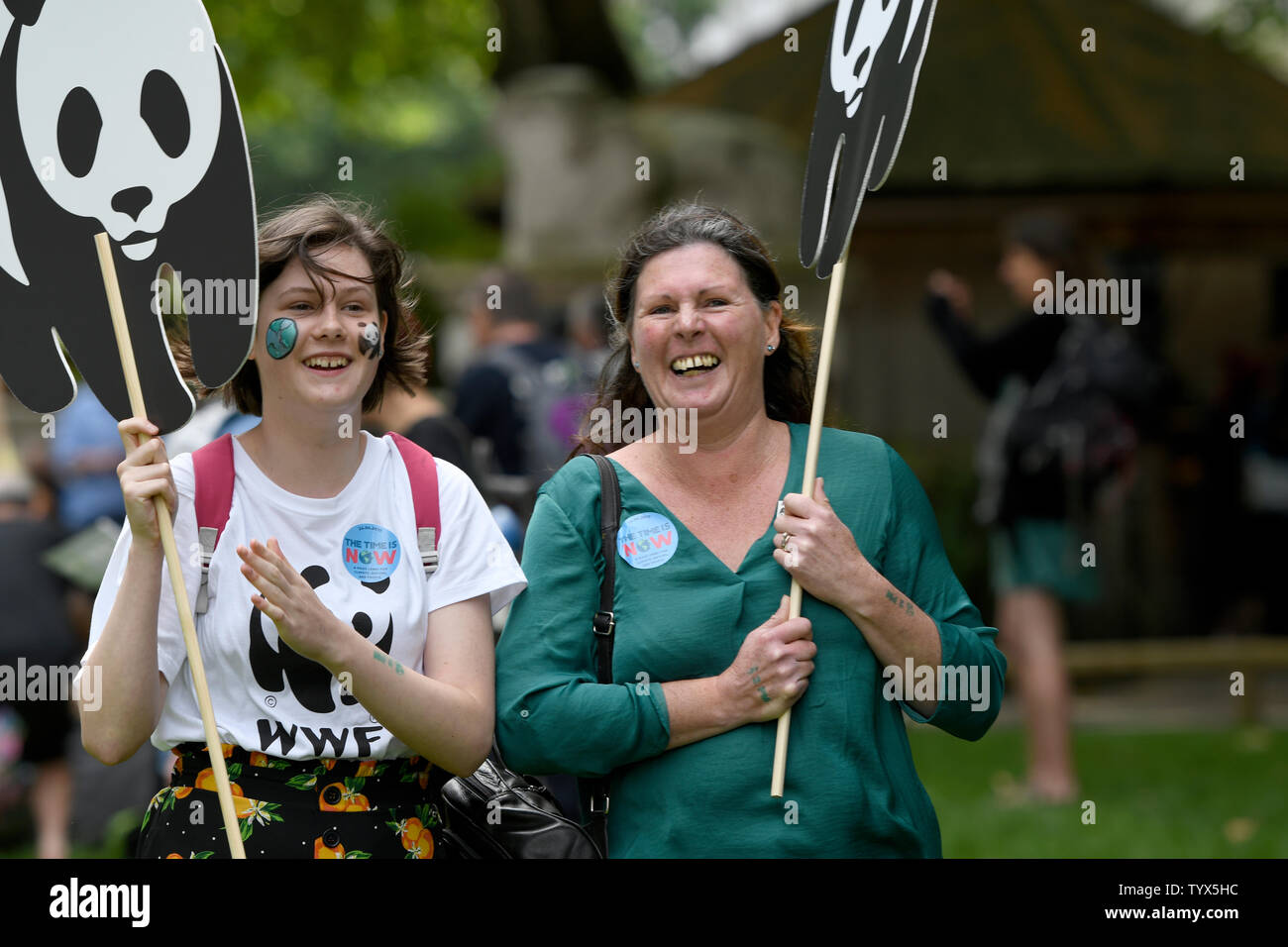 Environmental protesters hold placards  during the demonstration.Environmental protesters gathered around Westminster to lobby politicians and tell them that actions need to be done for climate and environment. They also demanded the MP’s to pass new laws to reduce emissions and tackle plastic pollution. Stock Photo