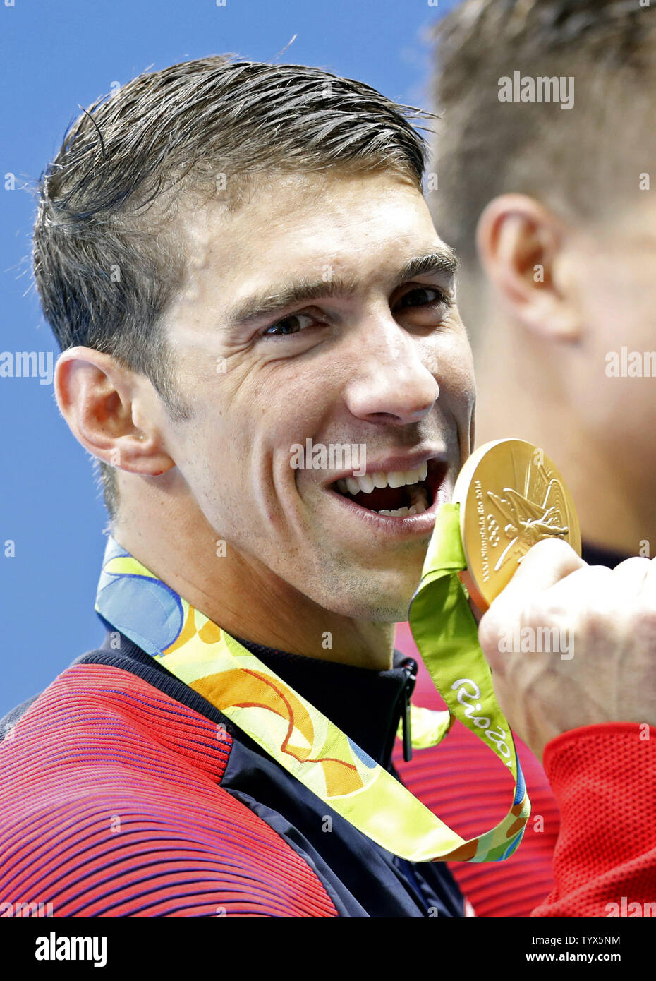 Michael Phelps Wearing 22 Medals