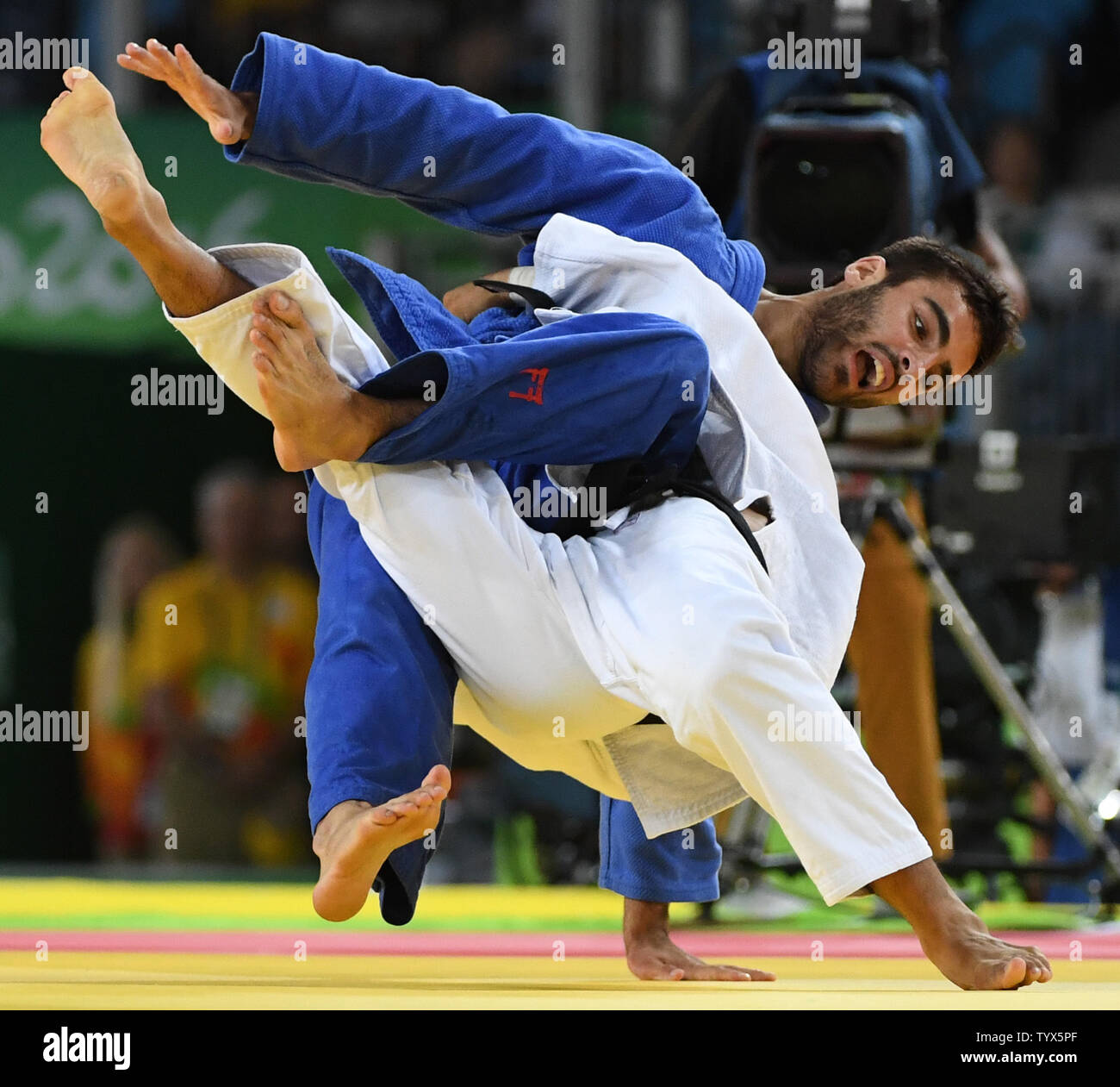 Antoine Bouchard of Canada tangles with Tumurkhuleg Davaadorj of Mongolia in 66KG Judo at the 2016 Rio Summer Olympics in Rio de Janeiro, Brazil, on August 7, 2016. Bouchard won the match.  Photo by Terry Schmitt/UPI Stock Photo