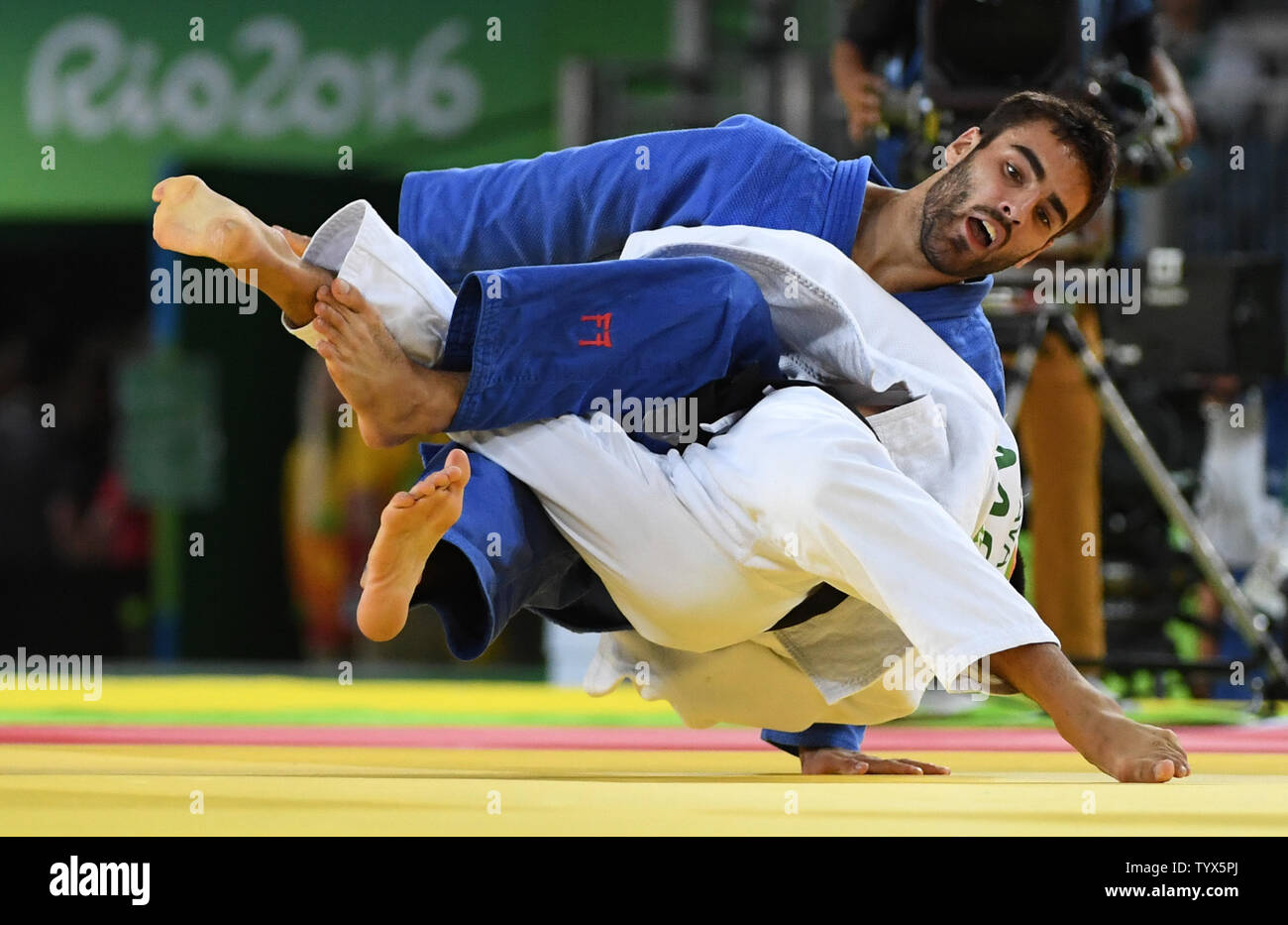 Antoine Bouchard of Canada tangles with Tumurkhuleg Davaadorj of Mongolia in 66KG Judo at the 2016 Rio Summer Olympics in Rio de Janeiro, Brazil, on August 7, 2016. Bouchard won the match.  Photo by Terry Schmitt/UPI Stock Photo