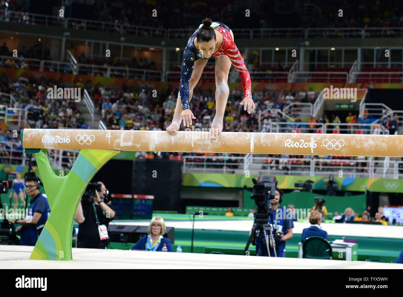 American gymnast Aly Raisman nearly falls as she competes in the ...
