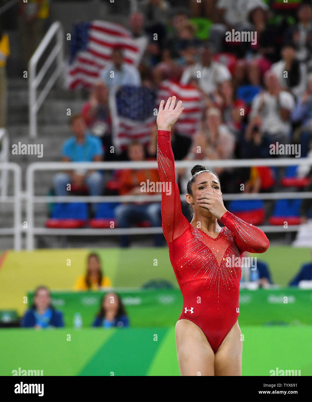 Aly Raisman of the United States reacts after a routine at the Women's ...