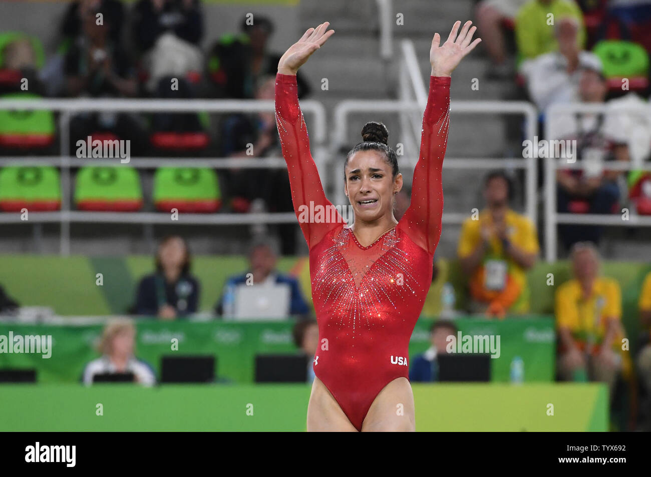 Aly Raisman of the United States reacts after a routine at the Women's ...