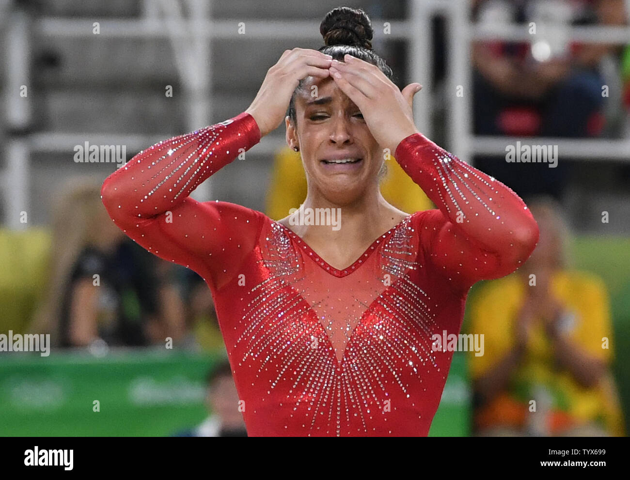 Aly Raisman of the United States reacts after a routine at the Women's ...