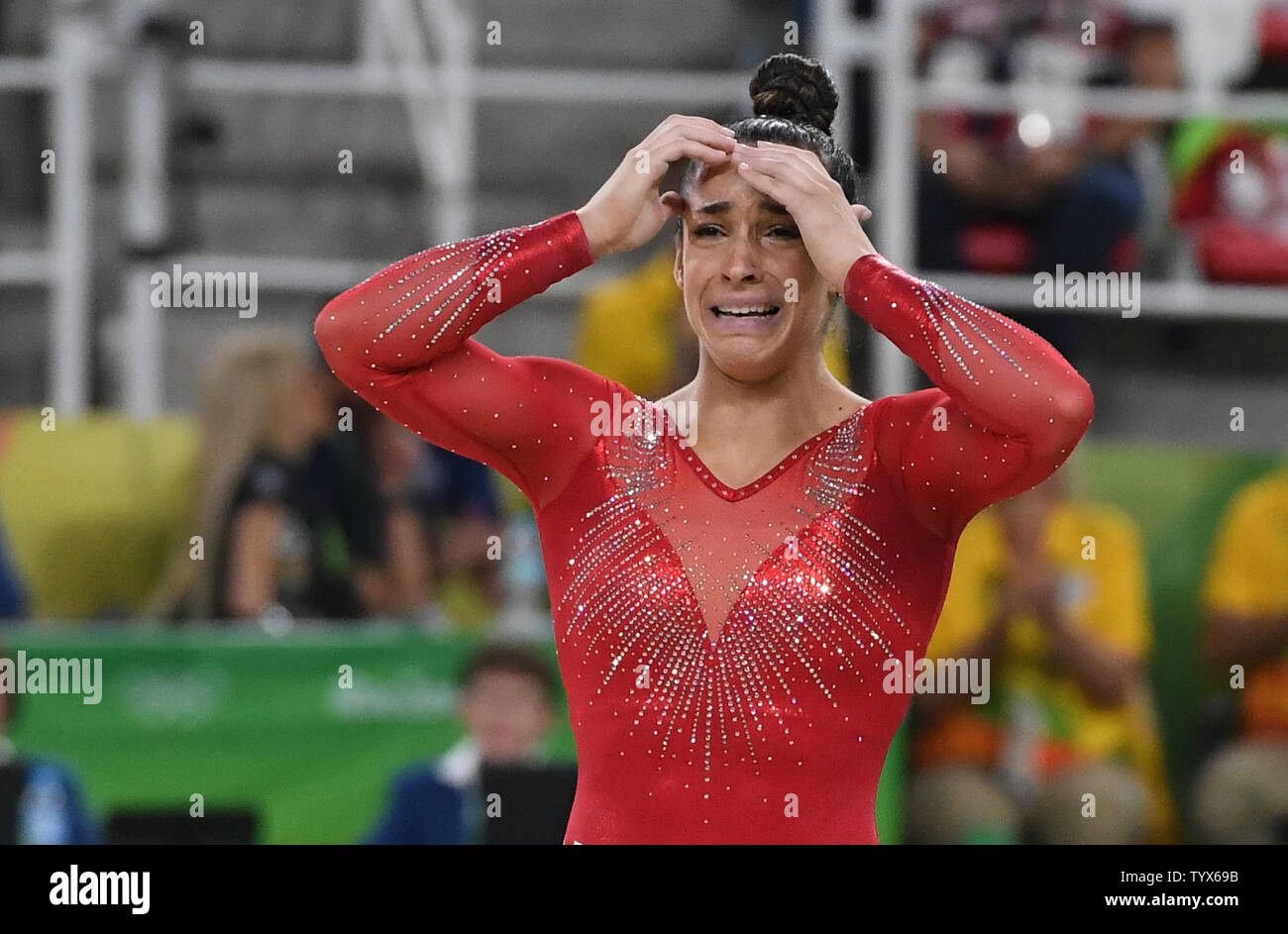 Aly Raisman of the United States reacts after a routine at the Women's ...