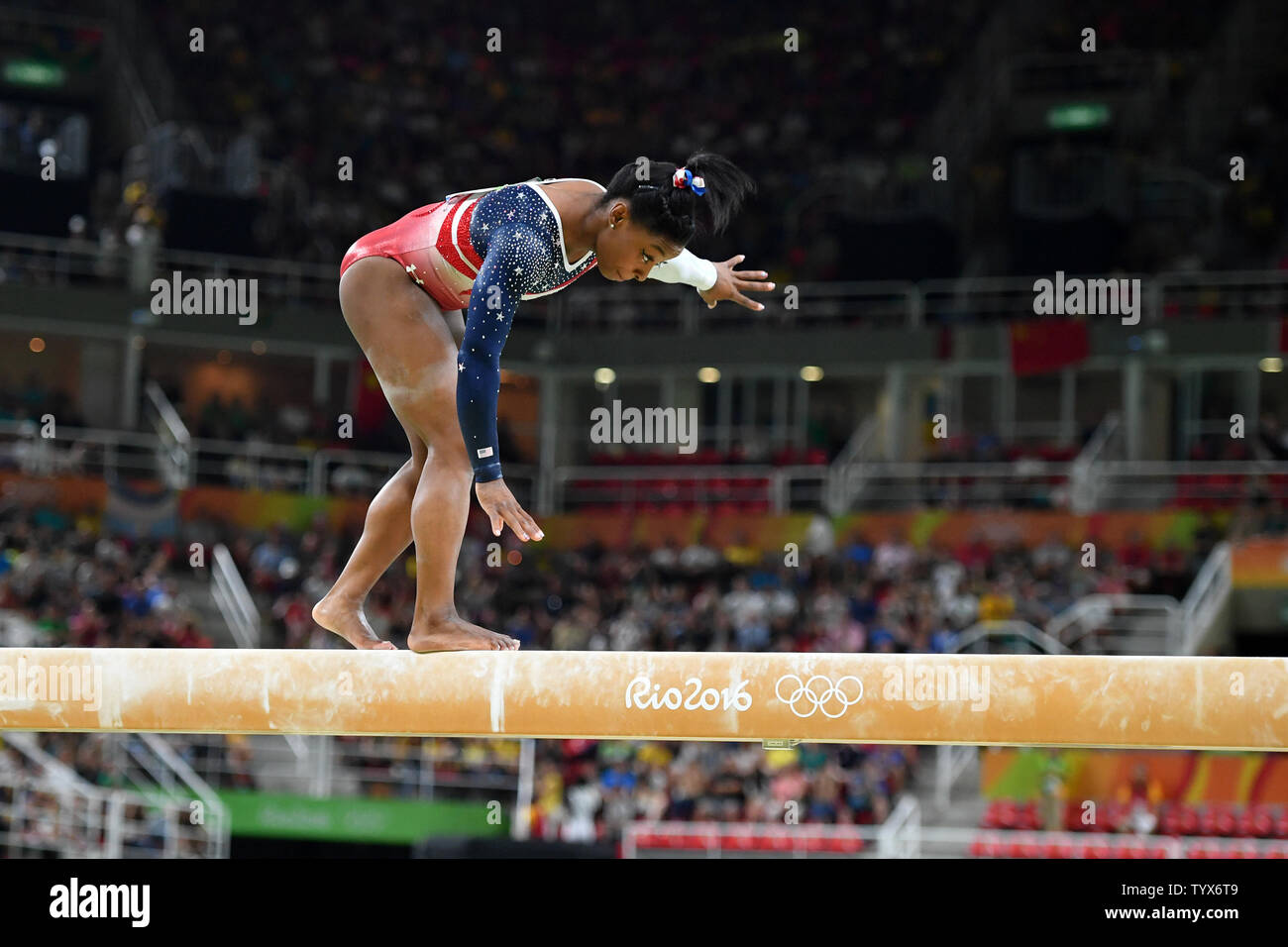 American gymnast Simone Biles stumbles as she competes on the balance ...