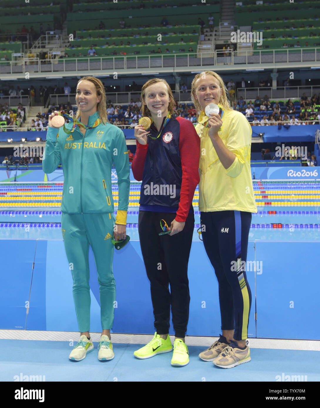 Bronze Medal winner Emma Mckeon of Australia, Gold Medal Winner Katie Ledecky of the United States and silver medalist Sarah Sjostrom of Sweeden stand with their medals after competing in the Women's 200m freestyle at the Olympic Aquatics Stadium at the 2016 Rio Summer Olympics in Rio de Janeiro, Brazil, on August 9, 2016.    Photo by Matthew Healey/UPI Stock Photo