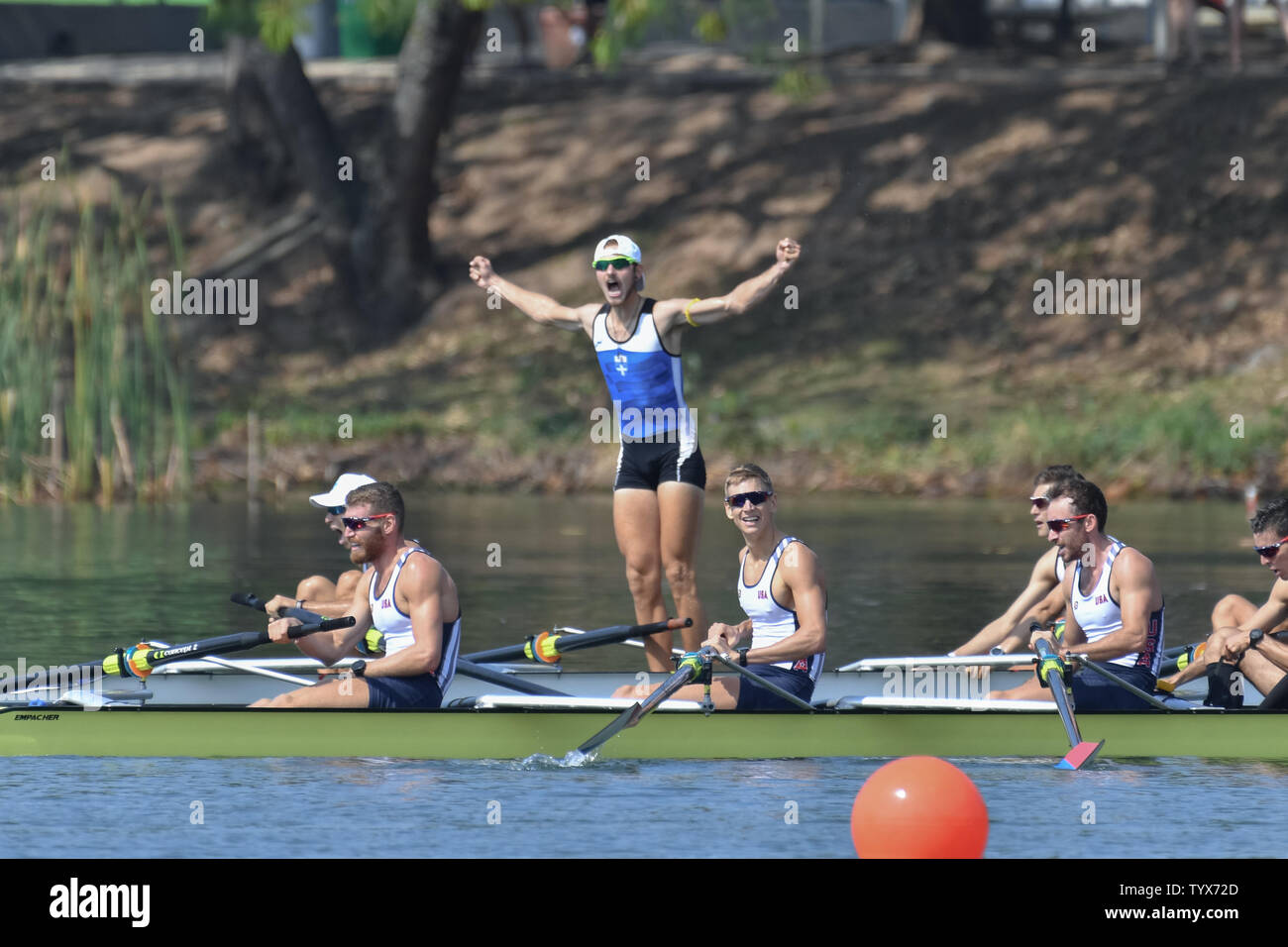 Panagiotis Magdanis, Stefanos Ntouskos, Loannis Petrou, and Spyridon Christos of Greece, celebrate after qualifying for the final round in the Men's coxless lightweight four semifinal heat during the 2016 Summer Olympics in Rio de Janeiro, Brazil, August 9, 2016. Greece came in third behind Switzerland and Denmark.   Photo by Richard Ellis/UPI Stock Photo