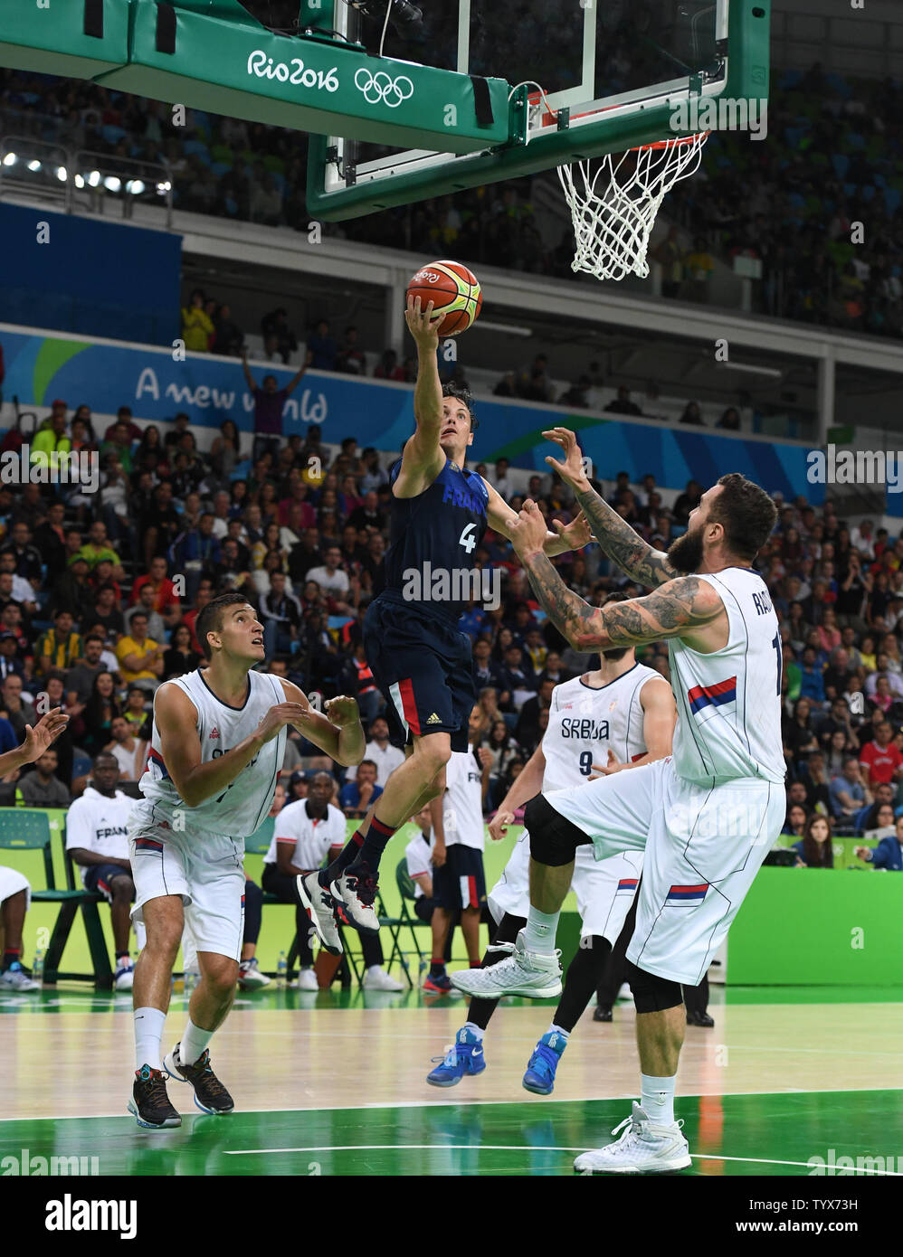 Thomas Heurtel (4) of France takes the ball to the basket against Serbia in Basketball at the 2016 Rio Summer Olympics in Rio de Janeiro, Brazil, August 10, 2016.  France defeated Serbia 76-75 in a come from behind victory in the last minute.  Photo by Terry Schmitt/UPI Stock Photo