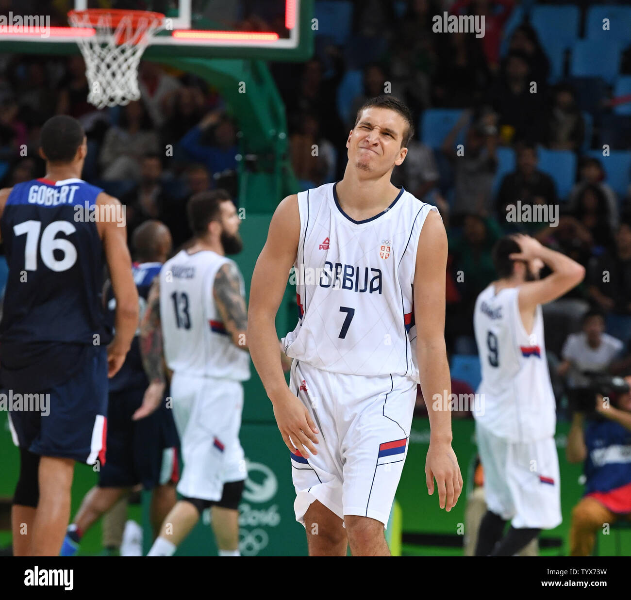 Bogdan Bogdanovic (7) and other Serbian players react to France winning in Basketball at the 2016 Rio Summer Olympics in Rio de Janeiro, Brazil, August 10, 2016.  France defeated Serbia 76-75 in a come from behind victory in the last minute.  Photo by Terry Schmitt/UPI Stock Photo