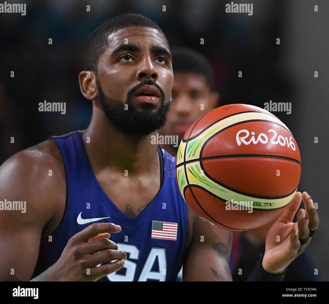 USA' s Kyrie Irving spins the basketball before delivering a coffin nail from the free throw line in the closing minute against Australia in Basketball at the 2016 Rio Summer Olympics in Rio de Janeiro, Brazil, August 10, 2016.  The USA defeated Australia 98-88.  Photo by Terry Schmitt/UPI Stock Photo