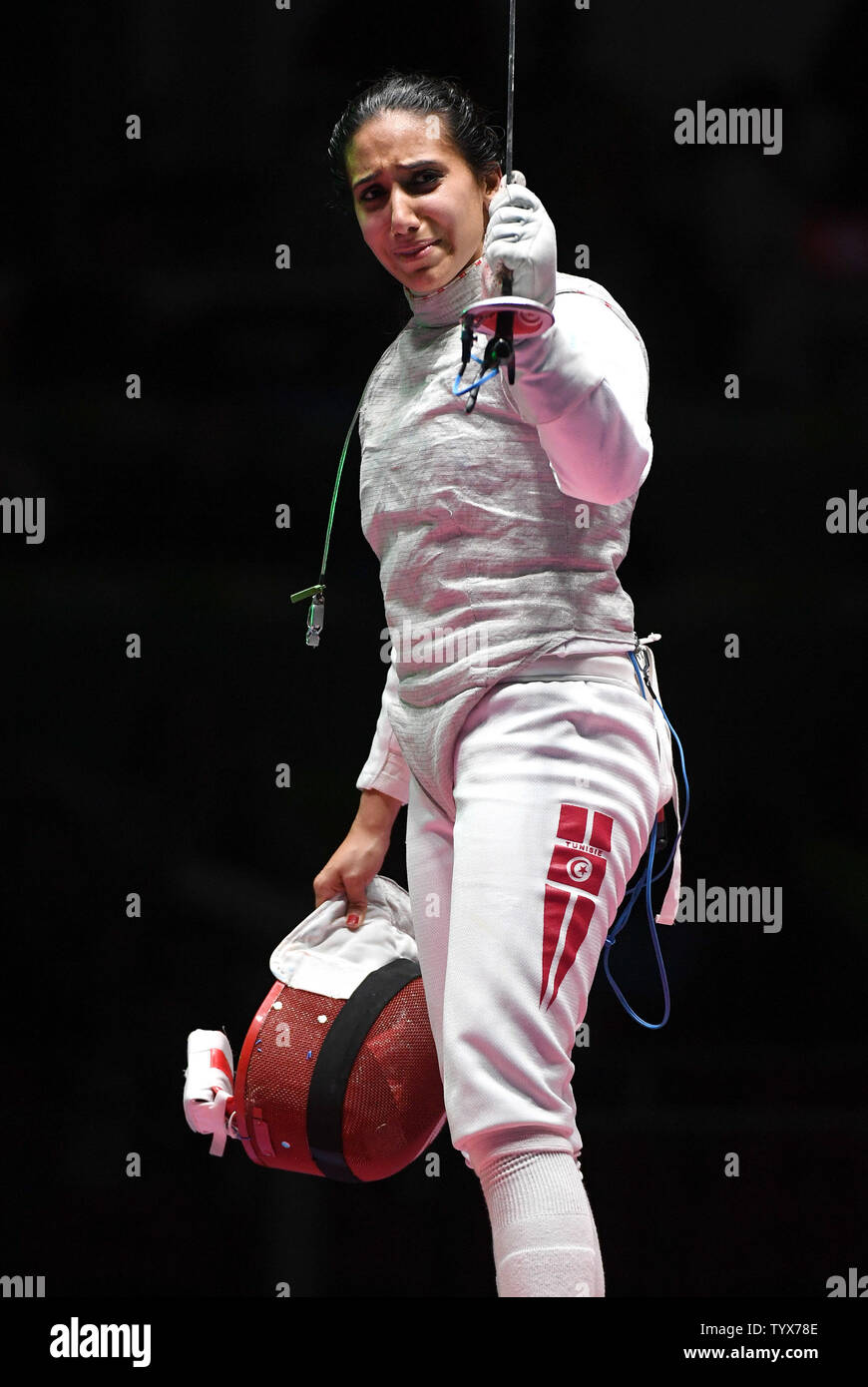 Tunisian Ines Boubakri celebrates after defeating Russian Aida Shanaeva