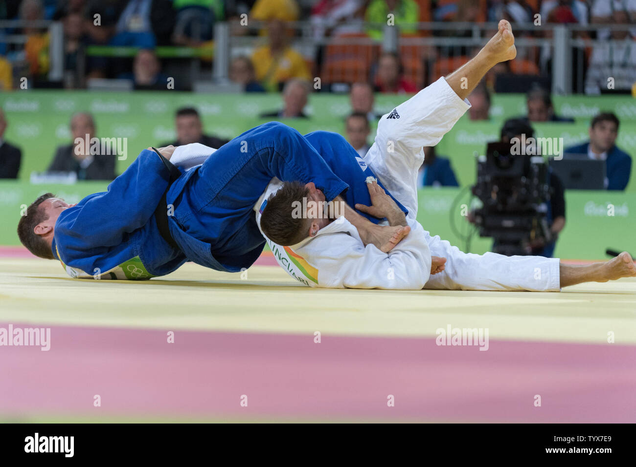 Dirk Van Tichelt of Belgium in blue during the Men's 73kg Judo bronze medal match  at Carioca Arena 2 in Rio de Janeiro, Brazil, August 8, 2016. Van Tichelt won the bronze medal and was later mugged celebrating on Copacabana Beach.     Photo by Richard Ellis/UPI.. Stock Photo