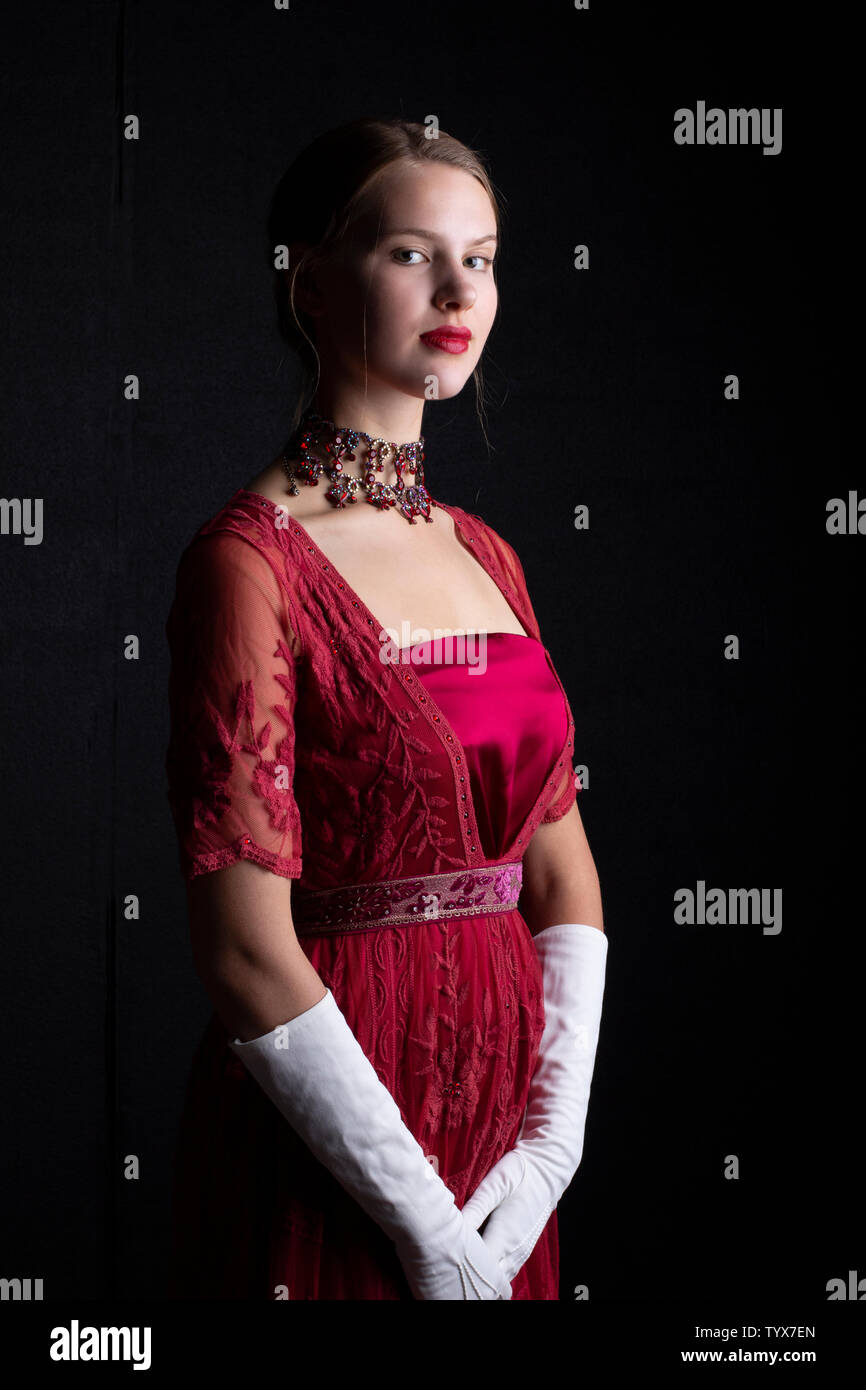 Glamorous woman in red dress hi-res stock photography and images - Alamy