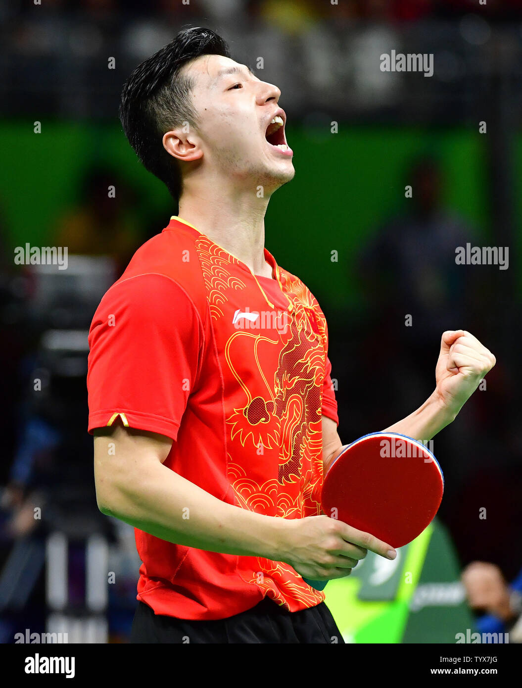 China's Ma Long celebrates in the final moments of his gold medal match against China's Zhang Jike in the Men's Singles Table Tennis final round 2016 Rio Summer Olympics in Rio de Janeiro, Brazil, August 11, 2016. Long went on to win gold for his second straight Olympic champion title. Photo by Kevin Dietsch/UPI Stock Photo