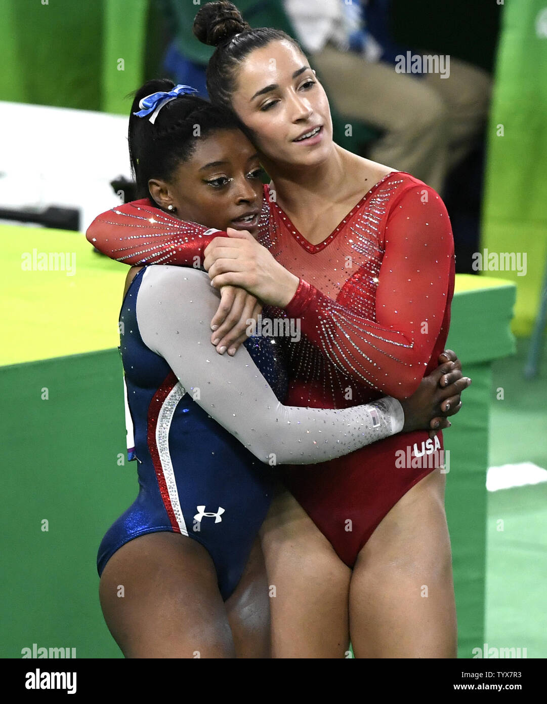 Aly Raisman and Simone Biles embrace on the olympic floor in the Floor ...