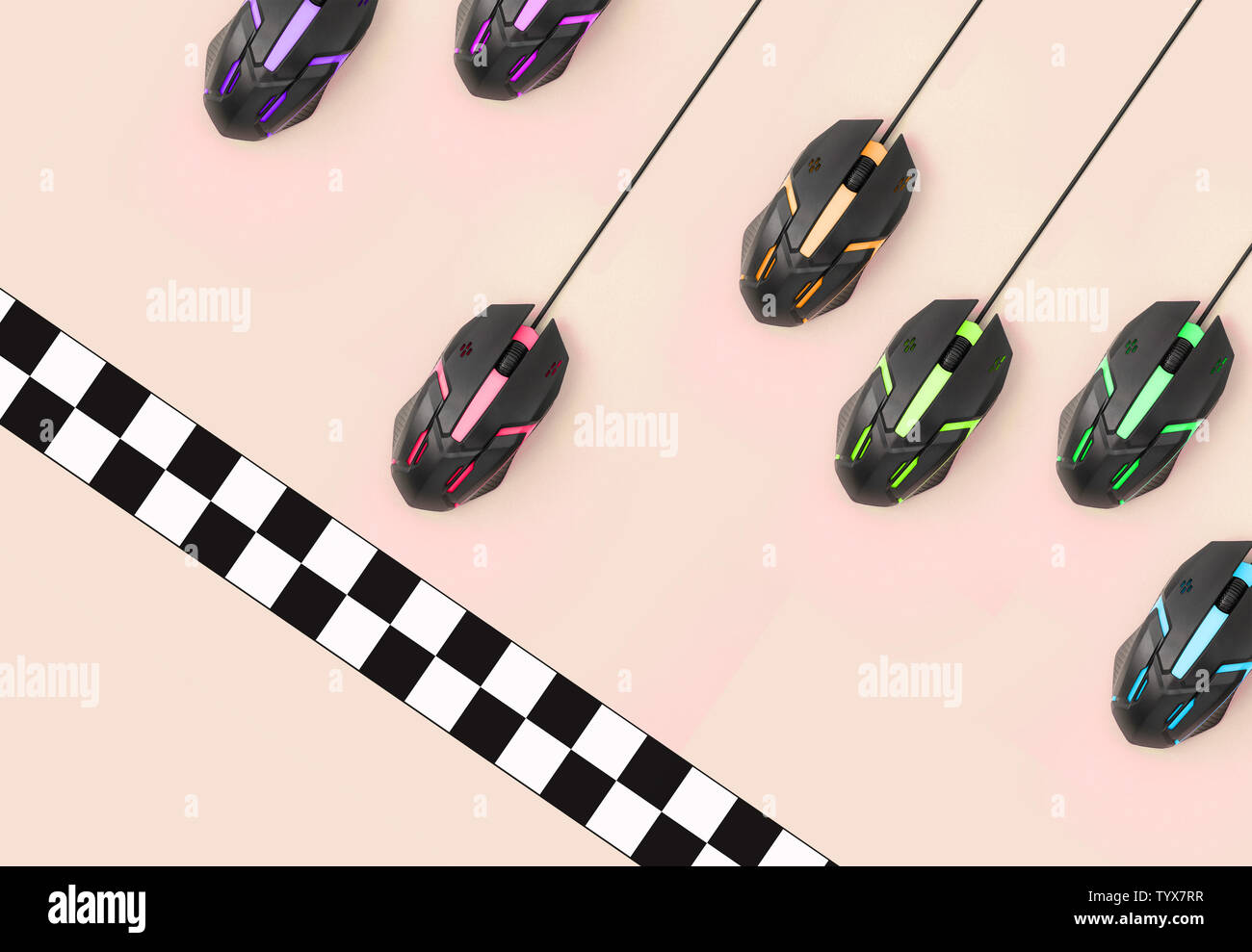 Metaphor of a sports race among computer mouses approaching the checkered finish line. The concept of eSports, high-speed hardware, Internet connectio Stock Photo