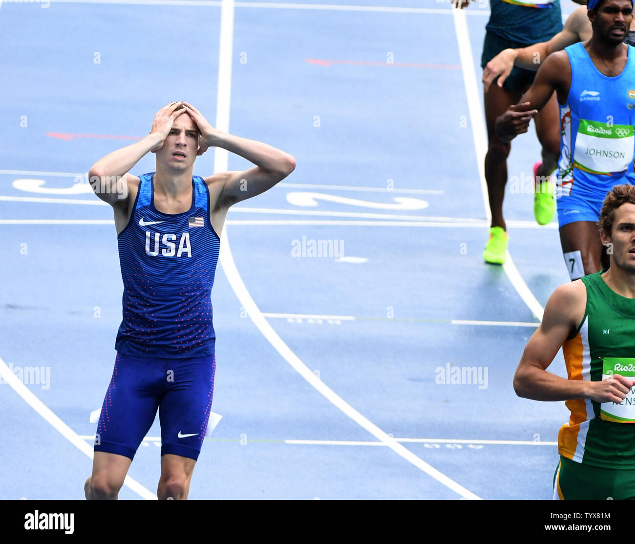 USA's Clayton Murphy holds his head after placing fourth in his heat of the Men's 800m in the Olympic Stadium at the 2016 Rio Summer Olympics in Rio de Janeiro, Brazil, August 12, 2016.     Photo by Terry Schmitt/UPI Stock Photo