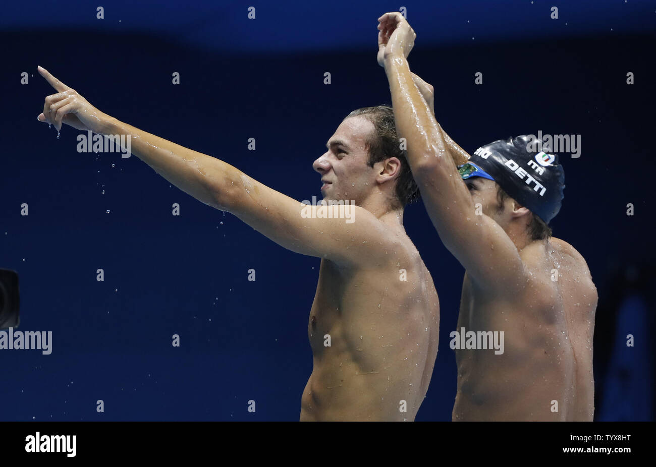 Gregorio Paltrinieri Of Italy Celebrates With Gabriele Detti Of Italy After He Wins The Gold Medal In The Men S 15000m Freestyle At The Olympic Aquatics Stadium At The 2016 Rio Summer Olympics